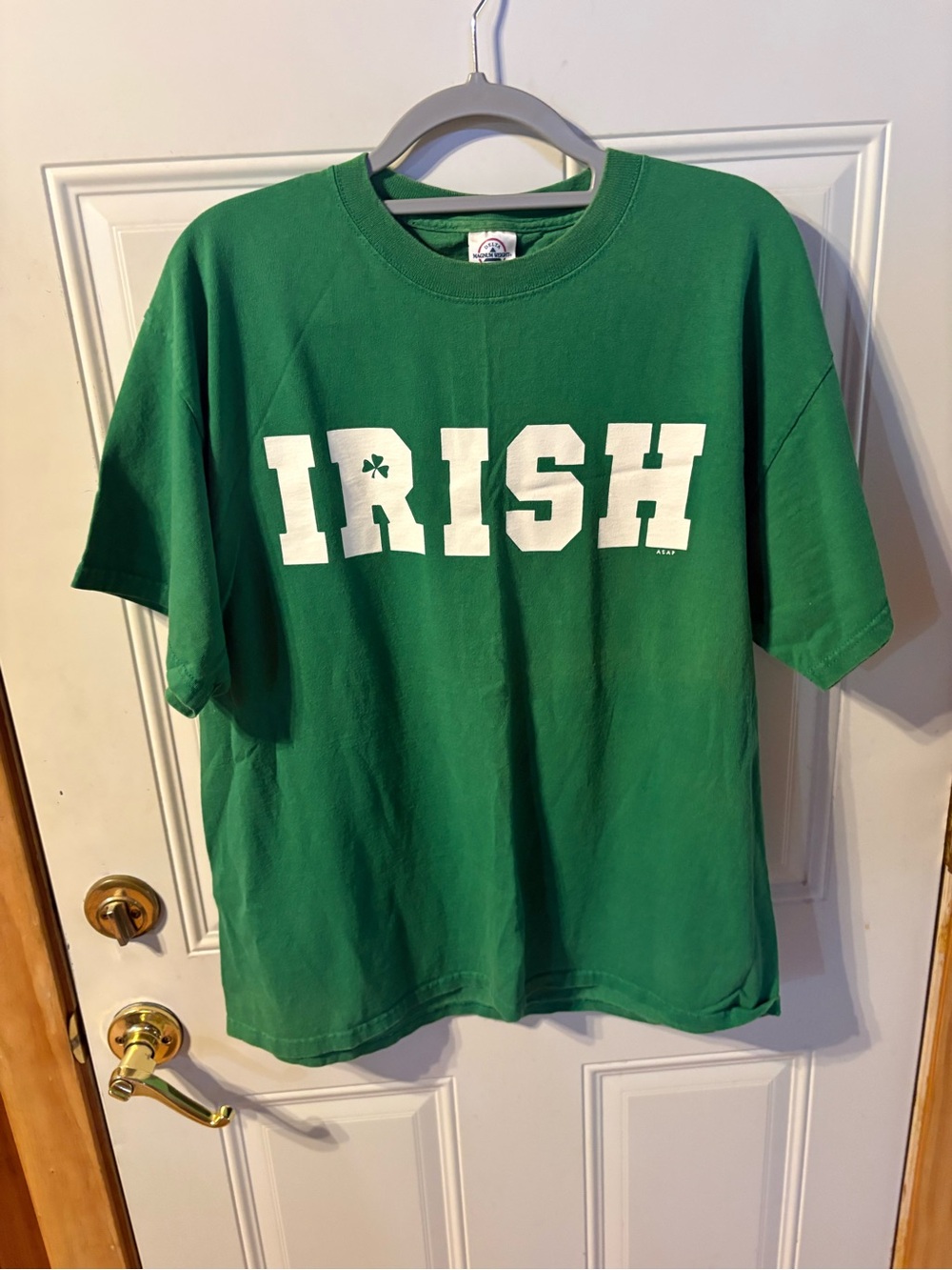 Delta Tee in Green Reads “IRISH" Graphic Size Large